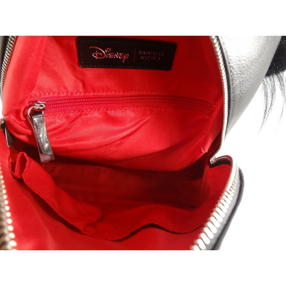 Danielle Nicole Disney Cruella Mini Backpack Black White NEW Pom Pom